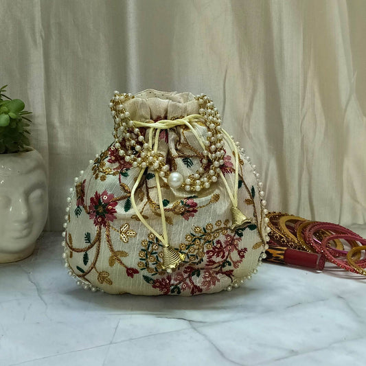 Ivory Dahlia Charm Potli